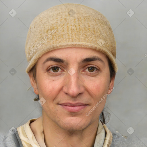 Joyful white adult female with short  brown hair and grey eyes