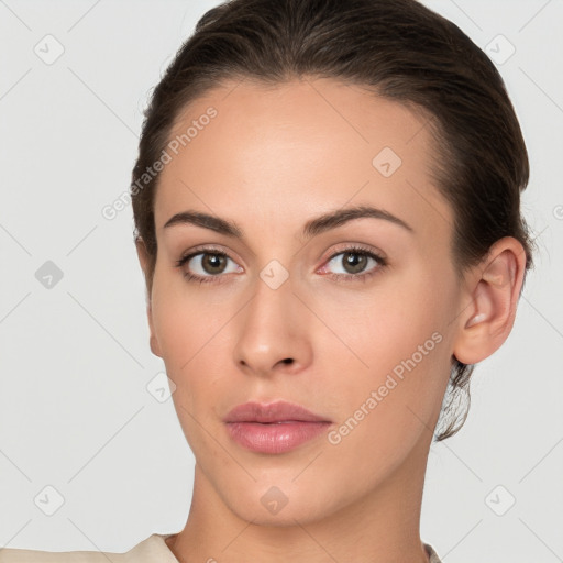 Neutral white young-adult female with short  brown hair and brown eyes