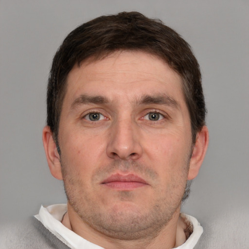 Neutral white adult male with short  brown hair and brown eyes