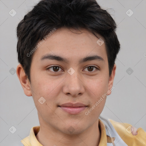Joyful asian young-adult male with short  brown hair and brown eyes
