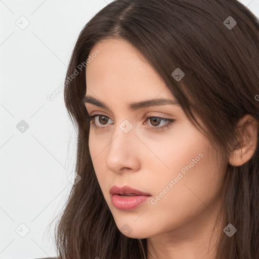 Neutral white young-adult female with long  brown hair and brown eyes