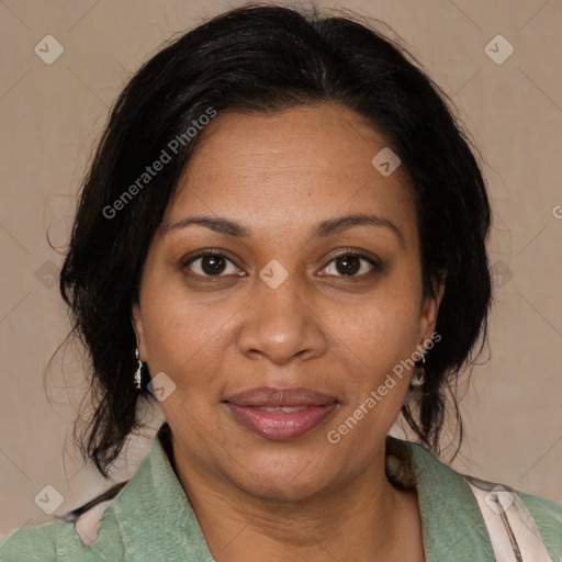 Joyful black adult female with medium  brown hair and brown eyes