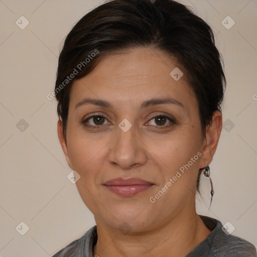 Joyful white adult female with short  brown hair and brown eyes