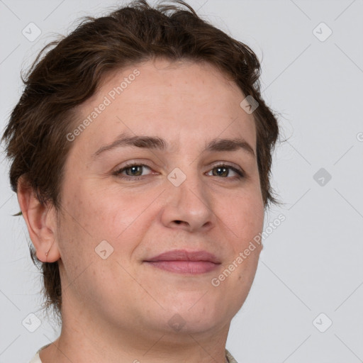 Joyful white adult female with short  brown hair and brown eyes