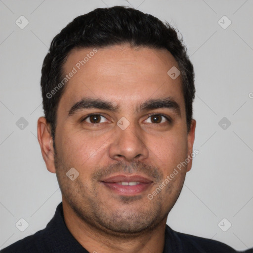 Joyful white young-adult male with short  black hair and brown eyes