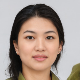 Joyful asian young-adult female with medium  brown hair and brown eyes