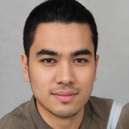 Joyful latino young-adult male with short  brown hair and brown eyes