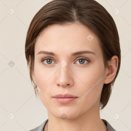 Neutral white young-adult female with medium  brown hair and grey eyes