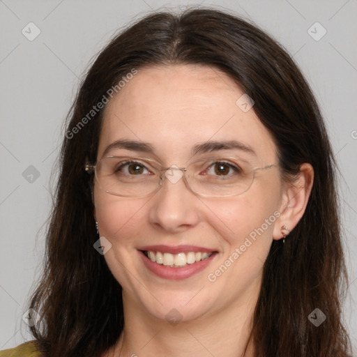 Joyful white adult female with long  brown hair and brown eyes