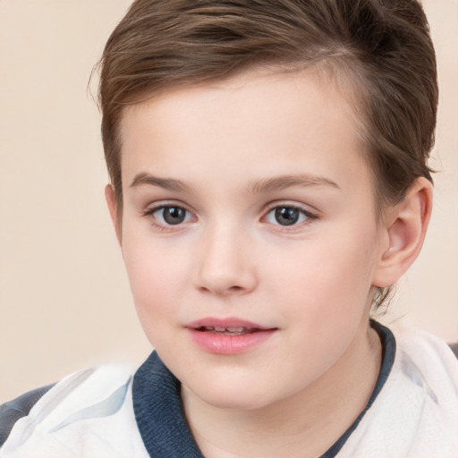 Joyful white child female with short  brown hair and brown eyes