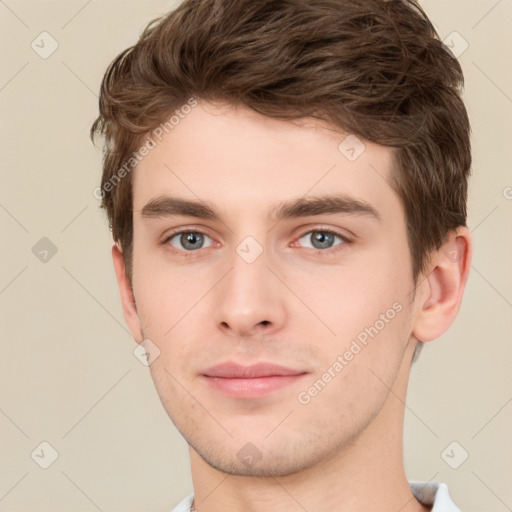 Neutral white young-adult male with short  brown hair and grey eyes