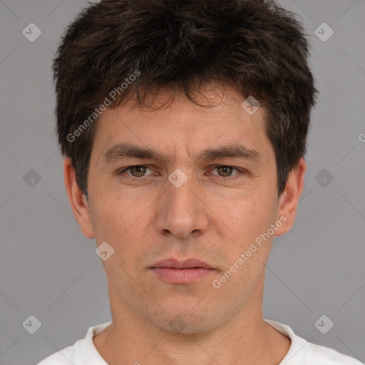 Neutral white adult male with short  brown hair and brown eyes