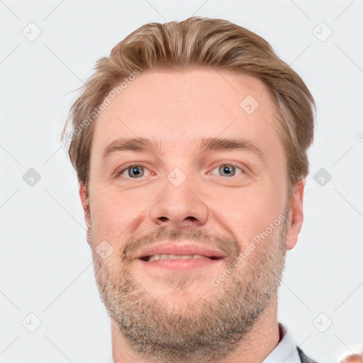 Joyful white adult male with short  brown hair and grey eyes