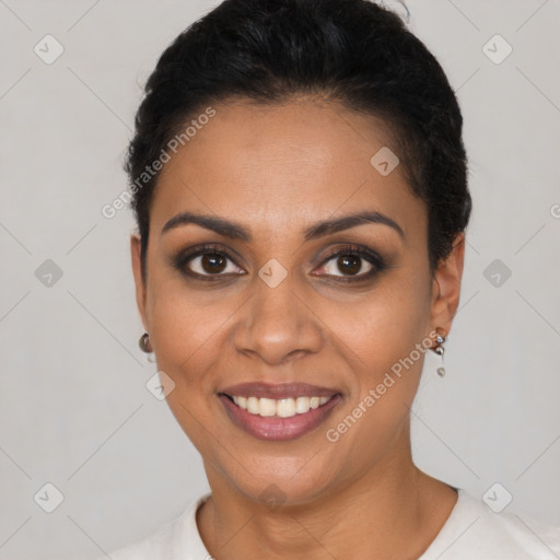 Joyful latino young-adult female with short  black hair and brown eyes