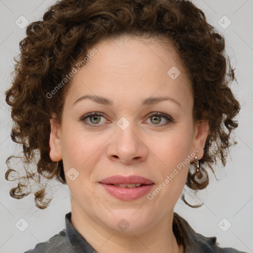 Joyful white young-adult female with medium  brown hair and green eyes