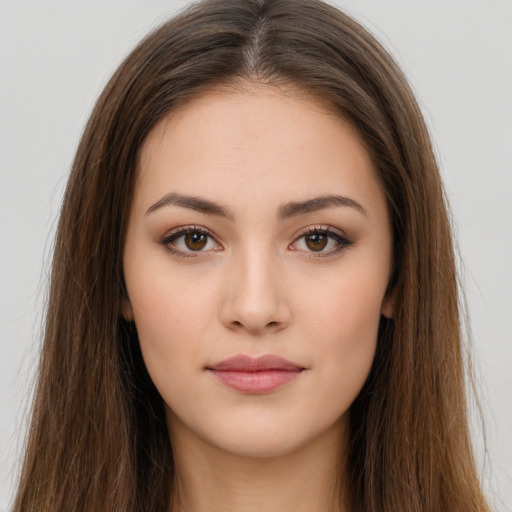 Neutral white young-adult female with long  brown hair and brown eyes