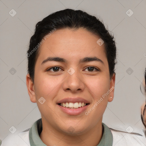 Joyful latino young-adult female with short  brown hair and brown eyes