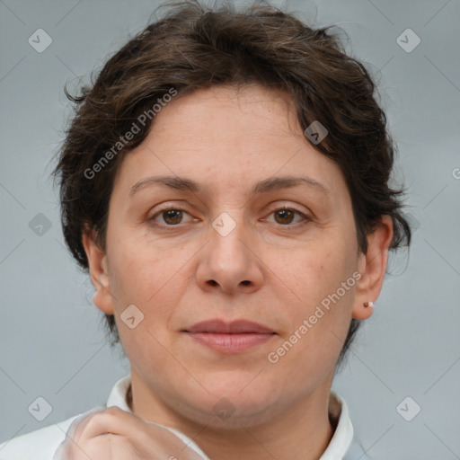 Joyful white adult female with short  brown hair and brown eyes