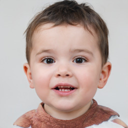 Joyful white child male with short  brown hair and brown eyes