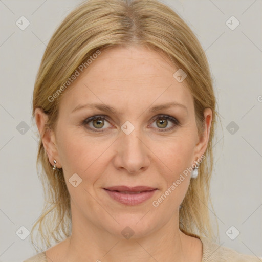 Joyful white adult female with medium  brown hair and grey eyes