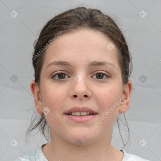 Joyful white child female with medium  brown hair and brown eyes