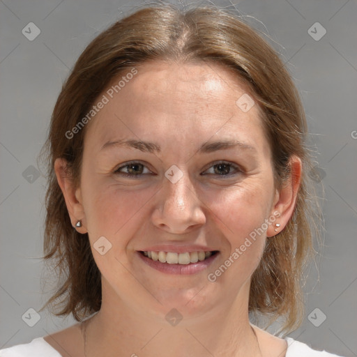 Joyful white young-adult female with medium  brown hair and grey eyes