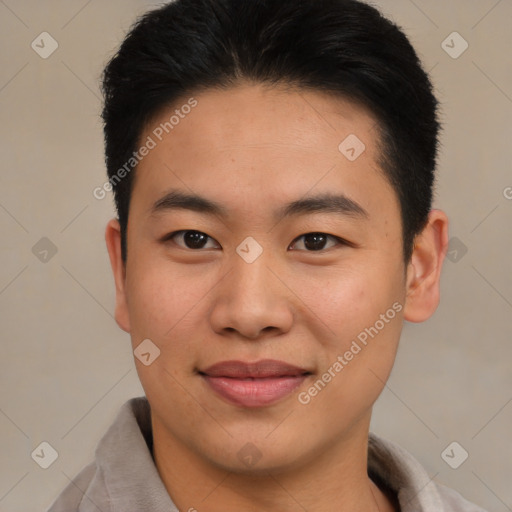 Joyful asian young-adult male with short  brown hair and brown eyes