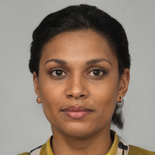 Neutral black young-adult female with short  black hair and brown eyes