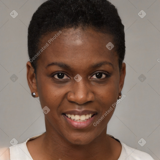 Joyful black young-adult female with short  brown hair and brown eyes