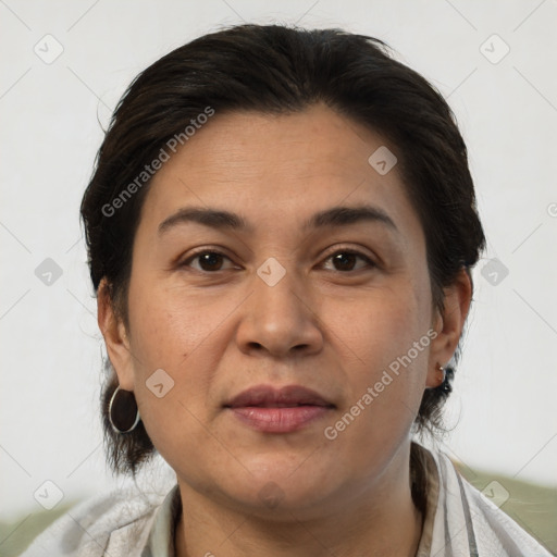 Joyful white adult female with medium  brown hair and brown eyes