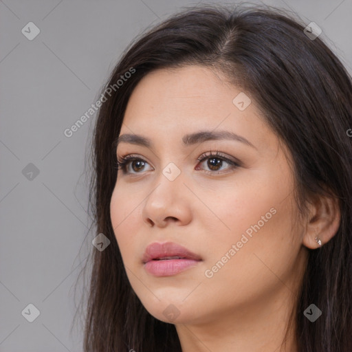 Neutral white young-adult female with long  brown hair and brown eyes