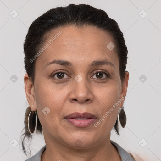 Joyful white adult female with short  brown hair and brown eyes