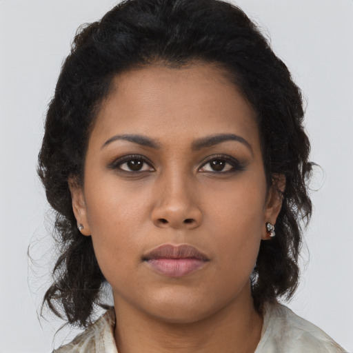 Neutral black young-adult female with long  brown hair and brown eyes