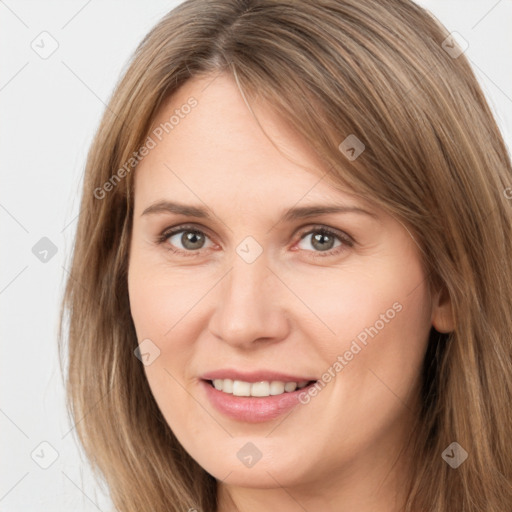 Joyful white adult female with long  brown hair and brown eyes