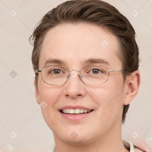 Joyful white adult female with short  brown hair and grey eyes