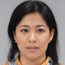 Neutral asian young-adult female with medium  brown hair and brown eyes