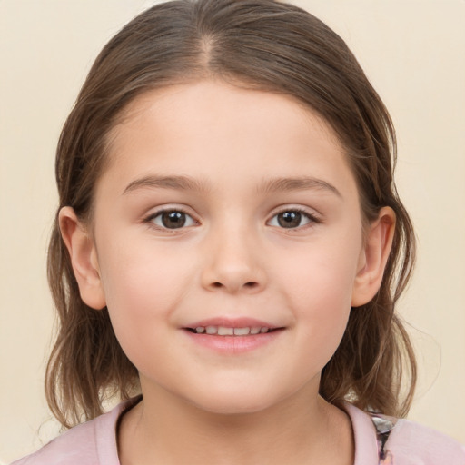 Joyful white child female with medium  brown hair and brown eyes