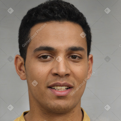 Joyful latino young-adult male with short  brown hair and brown eyes