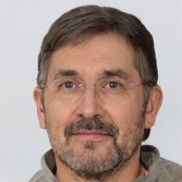 Neutral white middle-aged male with short  brown hair and brown eyes