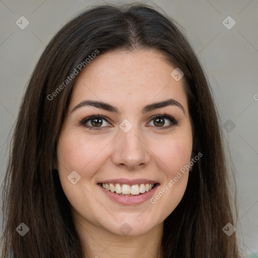 Joyful white young-adult female with long  brown hair and brown eyes