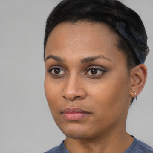 Neutral black young-adult female with short  black hair and brown eyes