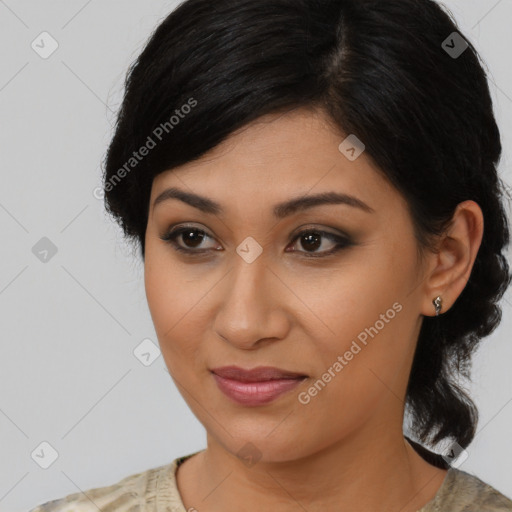 Joyful latino young-adult female with medium  brown hair and brown eyes