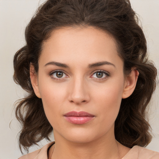 Neutral white young-adult female with medium  brown hair and brown eyes