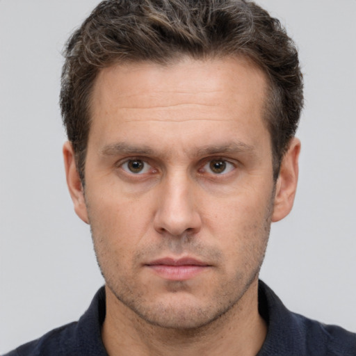 Neutral white adult male with short  brown hair and brown eyes