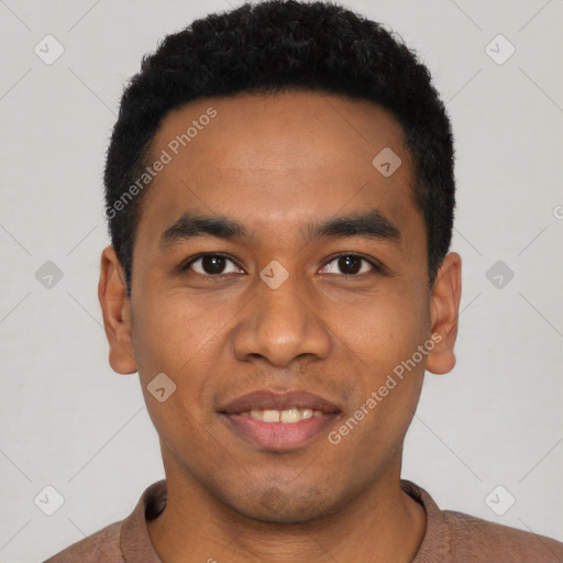 Joyful latino young-adult male with short  black hair and brown eyes