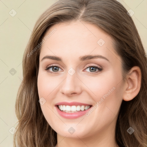 Joyful white young-adult female with long  brown hair and green eyes