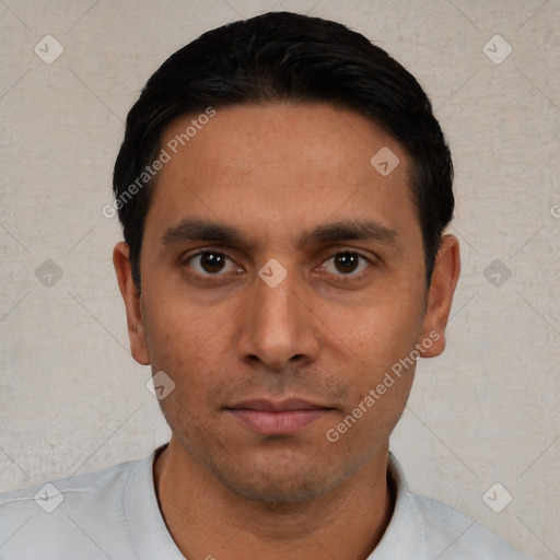 Neutral white young-adult male with short  black hair and brown eyes