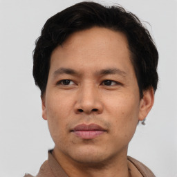 Neutral asian young-adult male with short  brown hair and brown eyes