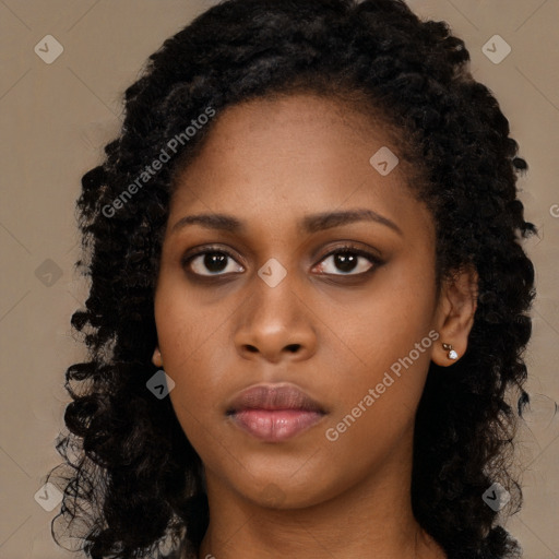 Neutral black young-adult female with long  black hair and brown eyes