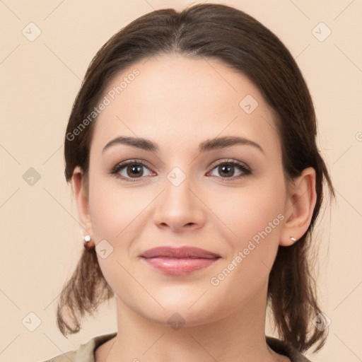 Joyful white young-adult female with medium  brown hair and brown eyes